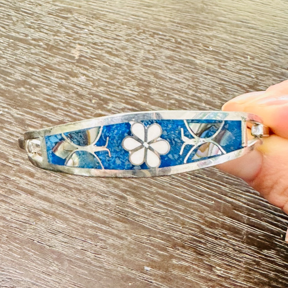 Vibrant alpaca bracelet with crushed turquoise and abalone butterfly accents!